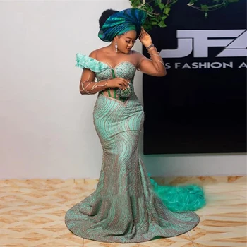 New Arrival Green Beaded Nėrinių vakarinės suknelės plius dydis African Mermaid Prom Gown Ruffled Train Nigerijos vestuvių priėmimo suknelė